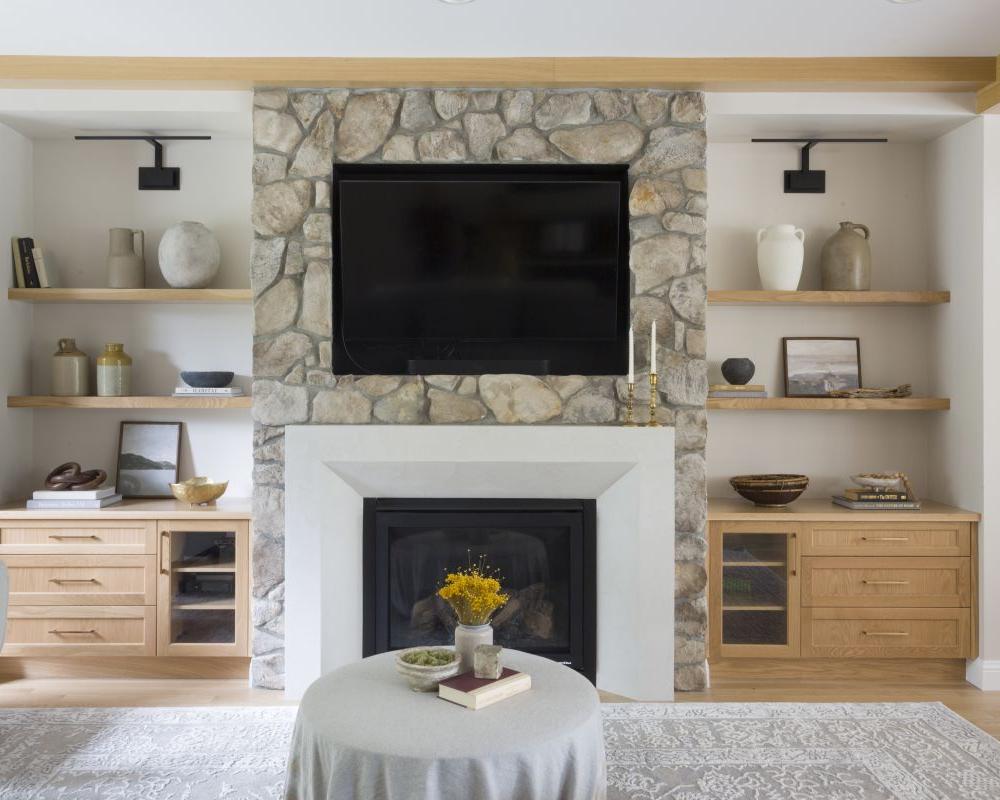 living room renovation with tv unit and floating shelves