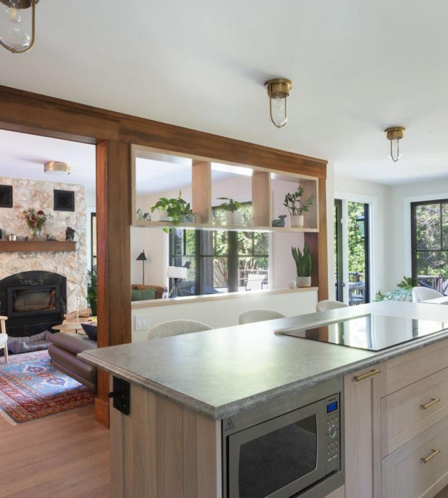 fully custom kitchen layout with stained wood beams