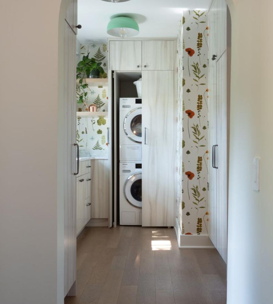 Stunning built in cabinetry and laundry room storage 