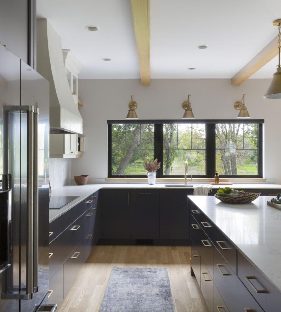 Riverfront home with large kitchen windows