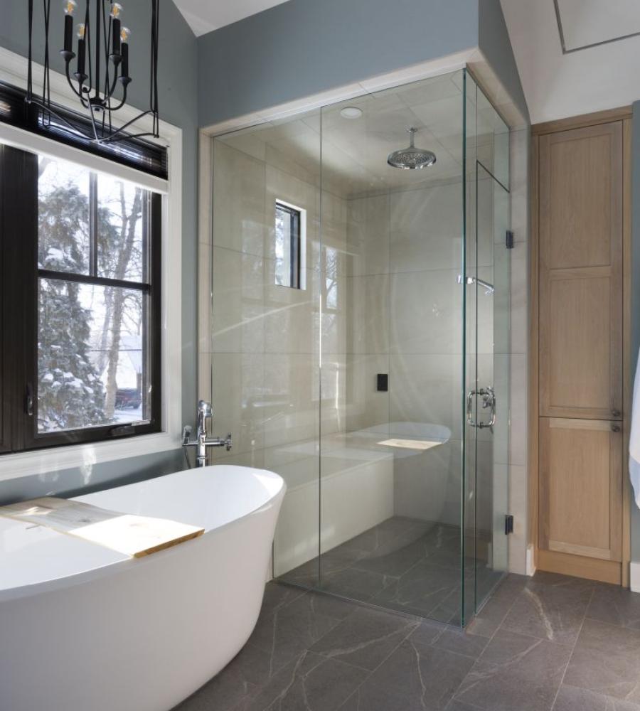 Stunning deep soaker tub with glass walk in shower