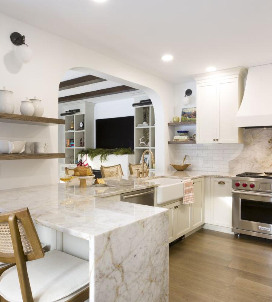 fully custom kitchen layout with stained wood beams