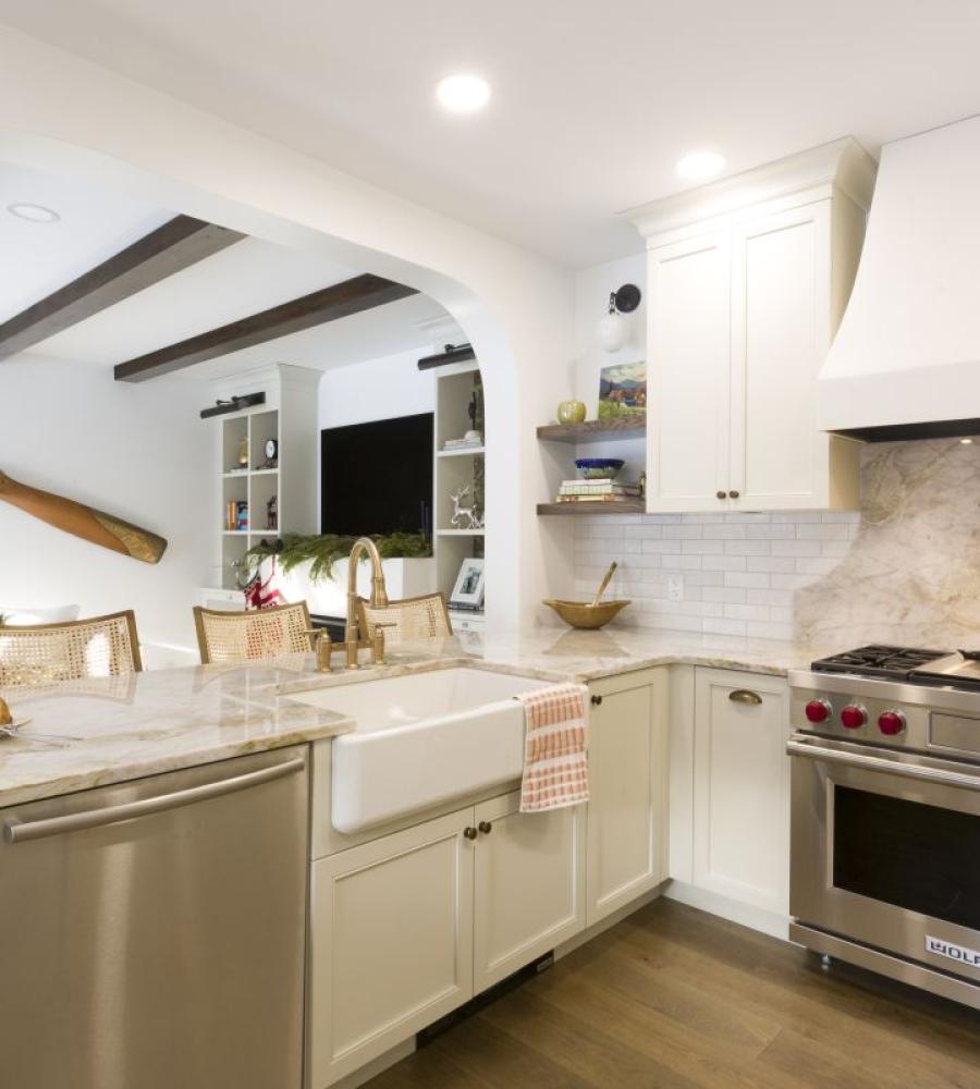 Custom kitchen with open concept and full height backsplash